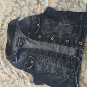 Denim vest by Maurices size Medium. Darker blue denim/copper color buttons